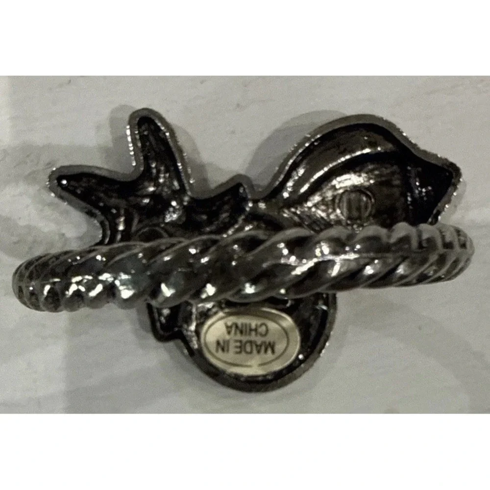 vintage silver-toned napkin rings Figuring Seashells